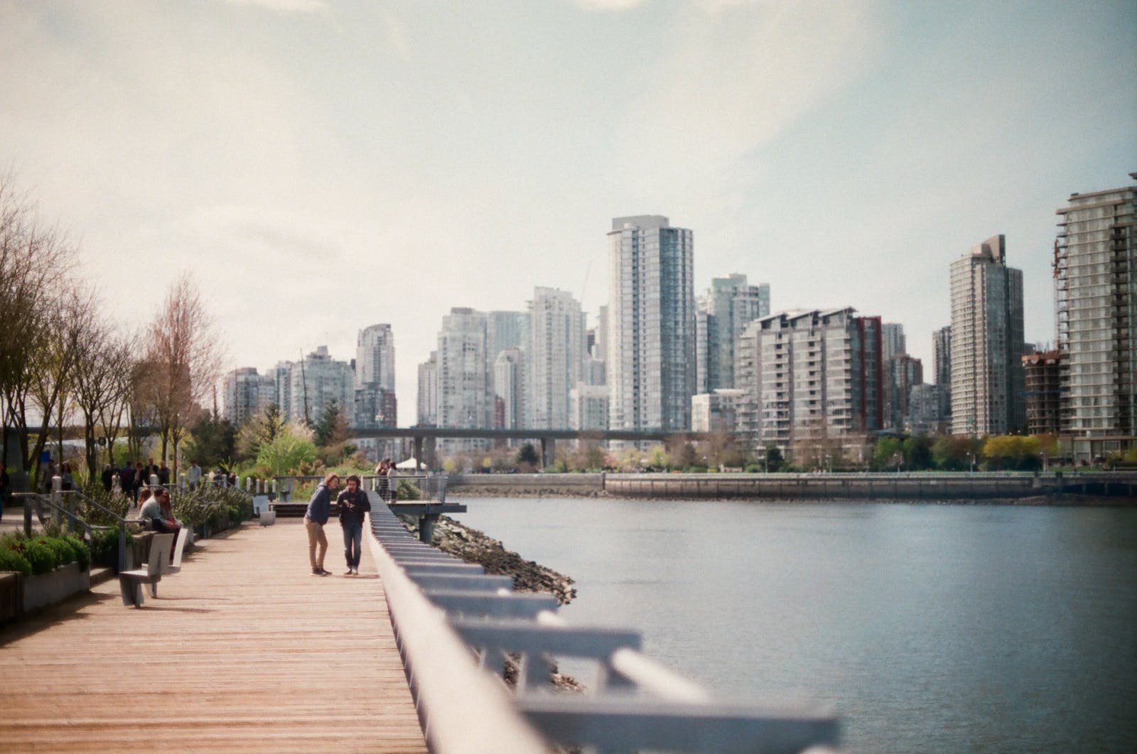 people walking at waterfront in vancouver