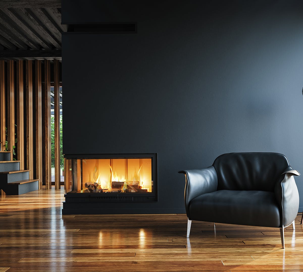 leather couch by fireplace