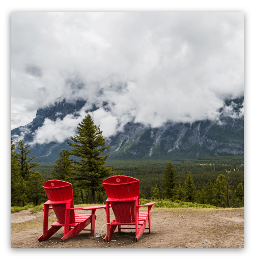 red chairs looking out at the rockies